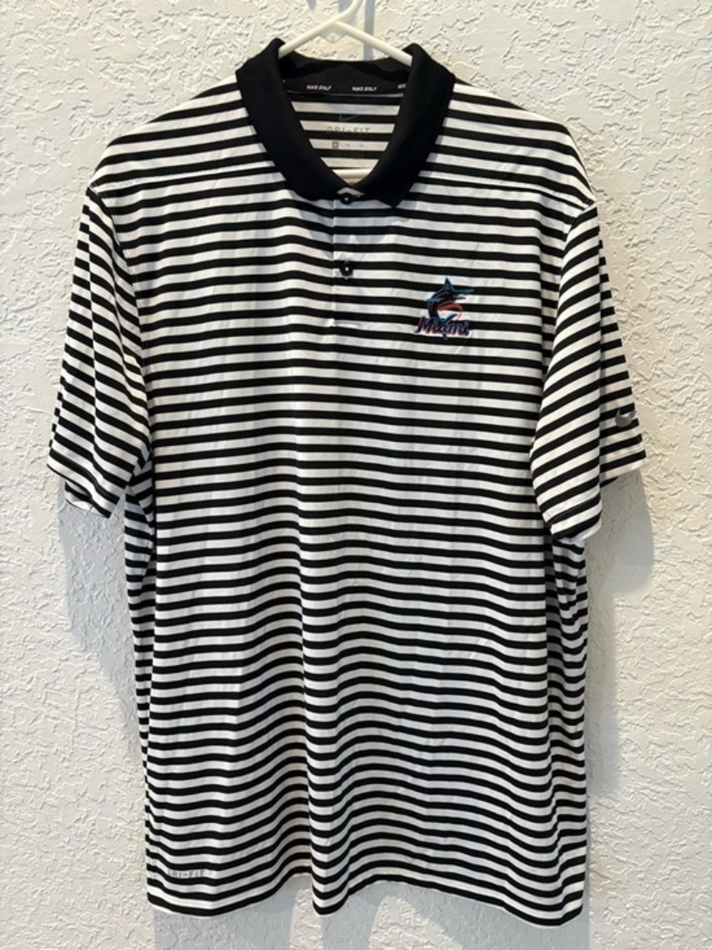 Nike Black & White Striped Polo with Embroidered Miami Marlins Logo